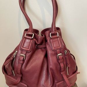 Cognac colored Coke Han leather bag.  Gently used, and in beautiful condition.